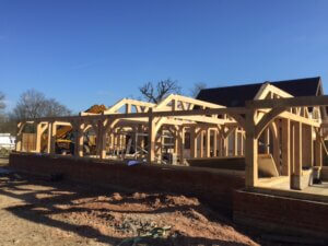 External view of an Oak Frame Build before SIPs are wrapped around