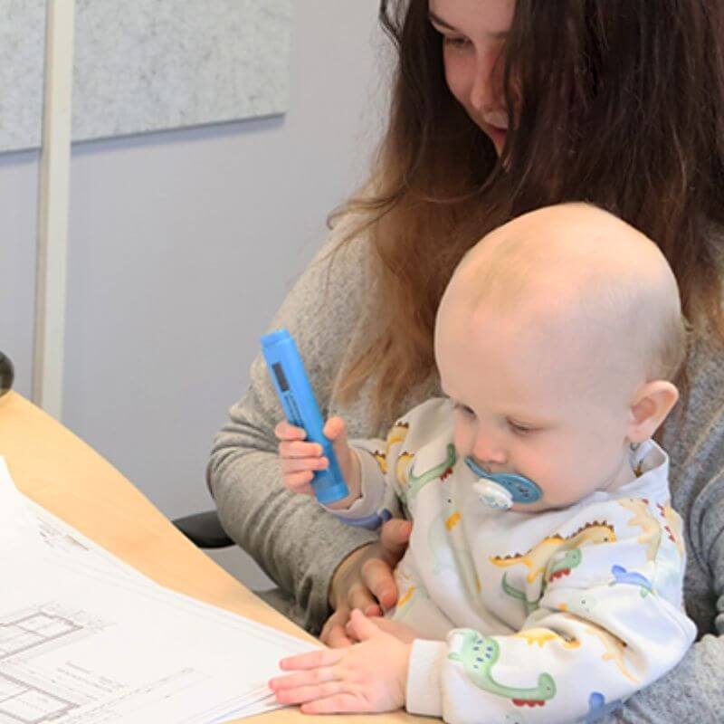 Beth from SIP Build UK Estimating Team holding baby Archie, ready to deliver fast, accurate SIP and pre-insulated timber frame project estimates
