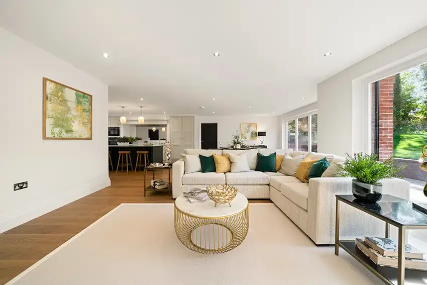Living room with natural light and energy-efficient SIP envelope.