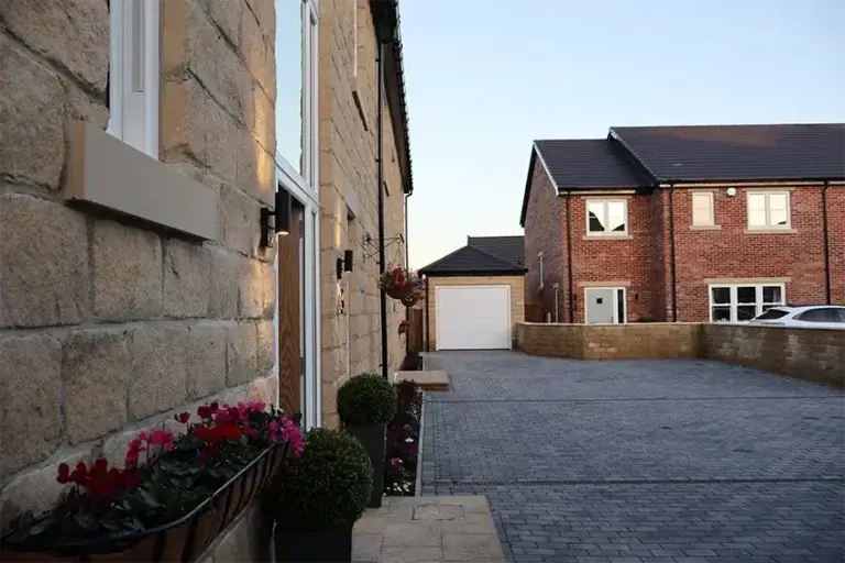 Completed home photographed at sunset/sunrise with warm lighting.