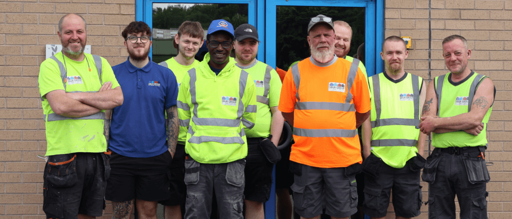 Part of the SBUK Group manufacturing team at the company's Yorkshire manufacturing facility, following the acquisition by SIP Building Systems (SBS).